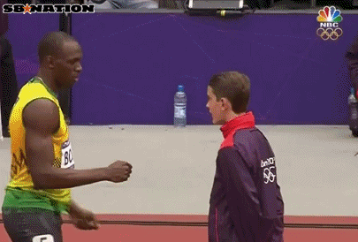 Usain-Bolt-Fake-Fist-Bump-Olympics-to-Volunteer
